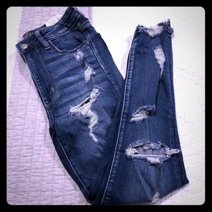 Distressed denim jeans